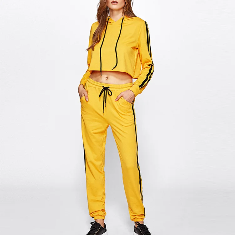 black tracksuit with yellow stripe