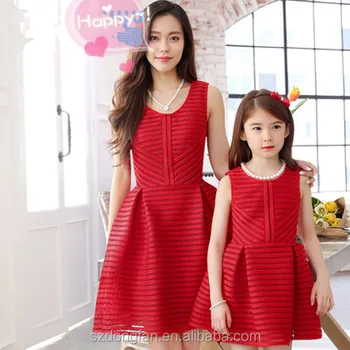matching red dresses for mother and daughter