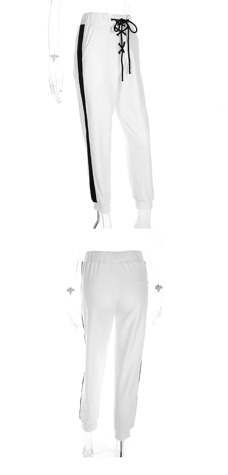 women's black track pants with white stripe