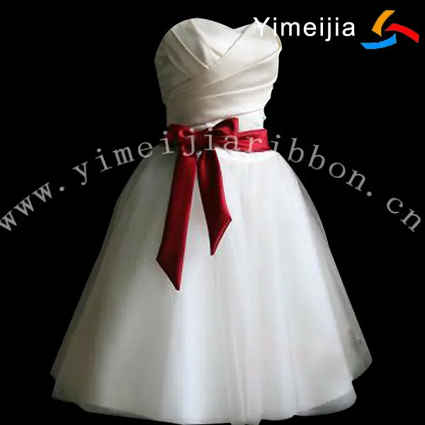 wedding dress with red ribbon on waist