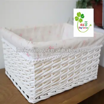 white rattan storage baskets