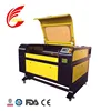 /product-detail/factory-price-6090-80w-100w-portable-fabric-wood-paper-co2-laser-cutting-machine-60757656131.html