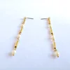 2019 New arrival dangle copper pipes and pearls spaced stud earrings in Dubai gold plating