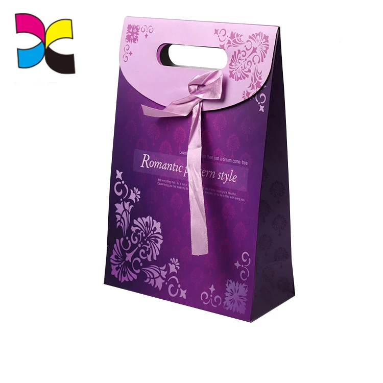 small purple gift bags