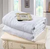 Wholesale White cotton fabric mulberry silk duvet/silk quilt handmade silk bedding sets