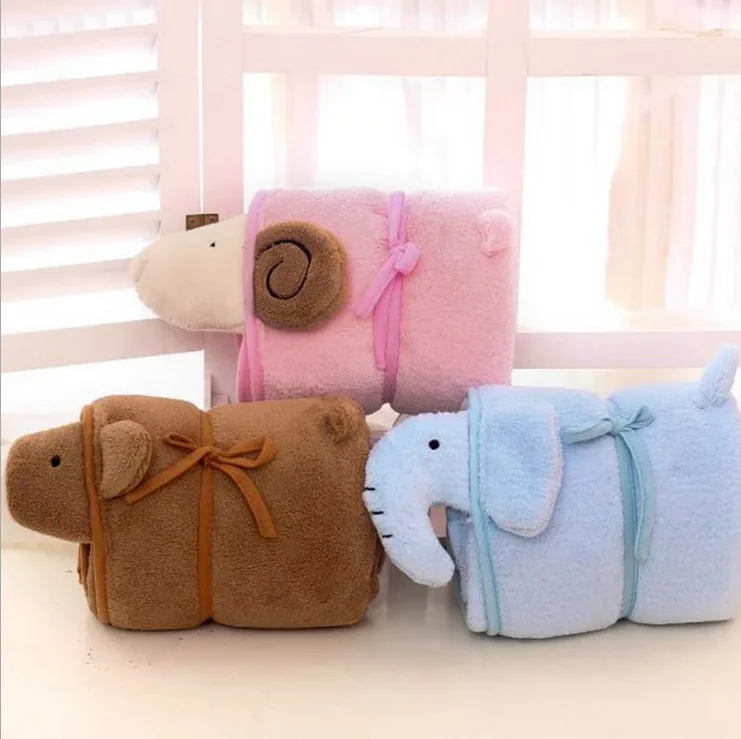 stuffed elephant with blanket