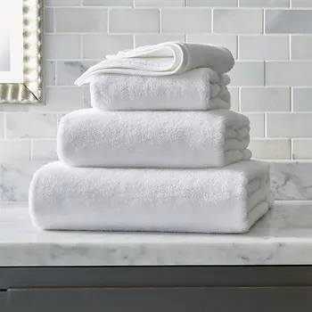 white cotton bath towels