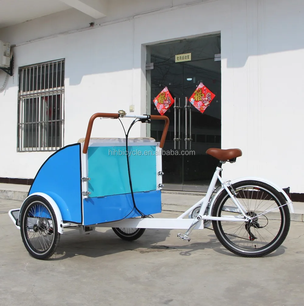 tricycle with 2 wheels in front