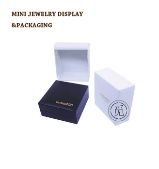 Deluxe Suede Slot Ring Box With A Beatiful Trim Feature An Deluxe Suede Slot Ring Box With A Beatiful Trim Feature An Outer Packer Creative