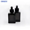/product-detail/black-glass-bottle-rectangle-perfume-bottle-glass-30ml-15ml-50ml-100ml-60822272153.html