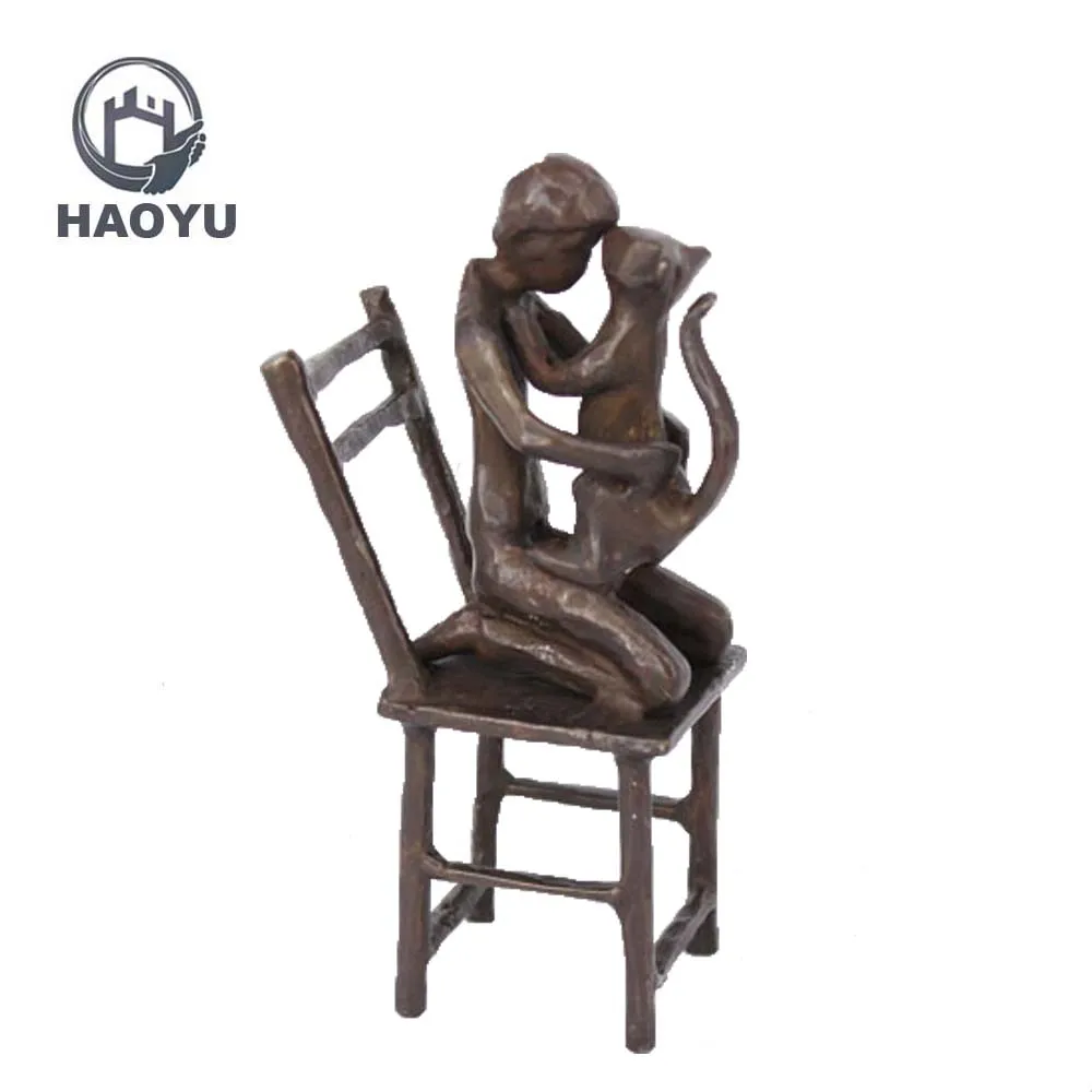 boy and dog sculpture