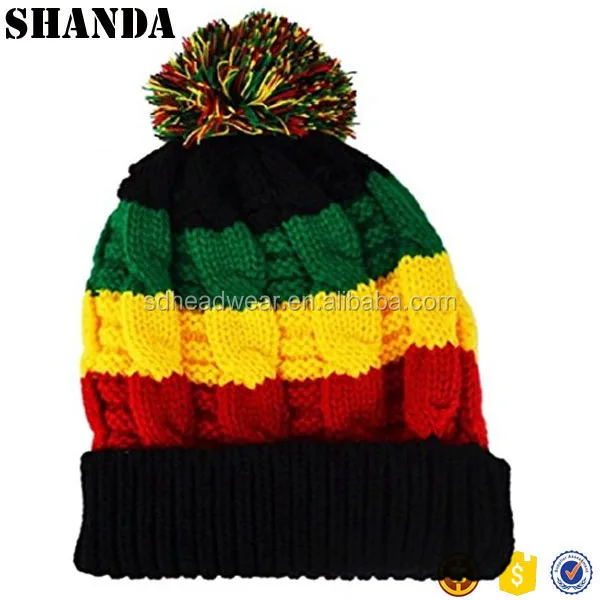 black and yellow bobble hat