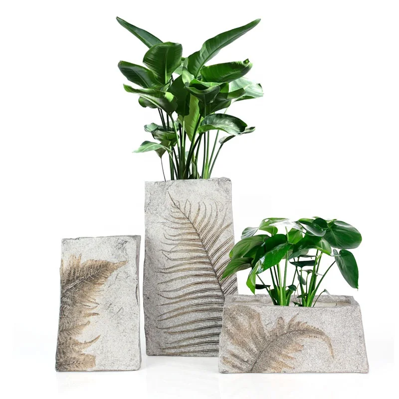 Custom Artificial Resin Quartz sand Fossil Leaves Flower Vase for Indoor Home Decor manufacture