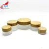 /product-detail/factory-wholesale-cosmetic-bamboo-jar-clear-frosted-glass-cream-jar-bj-021rl-62311274475.html