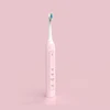 Thin long handle black homes oralwise smart auto toothbrush