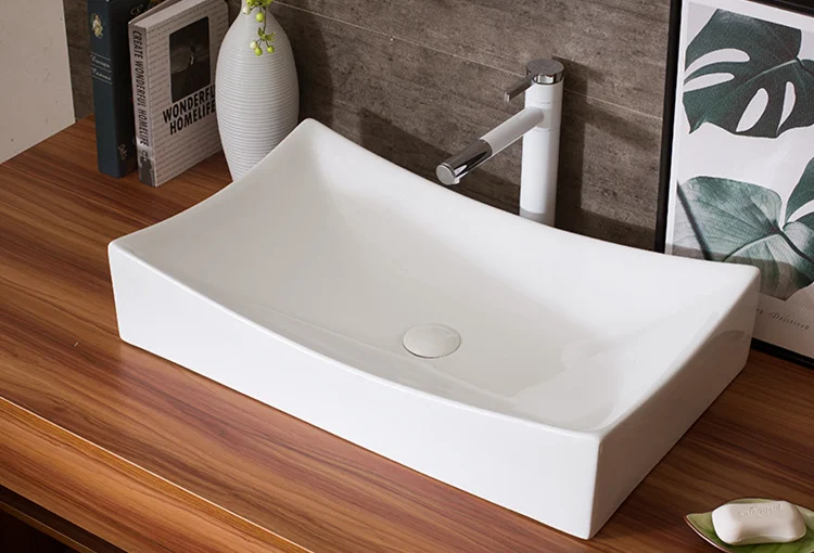 Ceramic table mounted vessel sink white