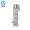 Self cleaning transfer raw materials bucket elevator for rubber processing