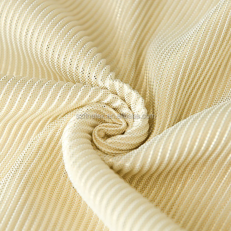 批发柔软触感midium重量涤纶针织金色印花绉纱褶皱面料女士宽松裤子