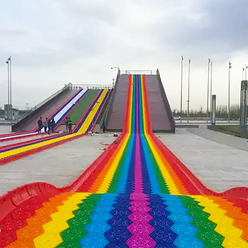
Funny Outdoor Playground Amusement Games Children Grass Sliding Way Rainbow Dry Snow Slide For Sale 