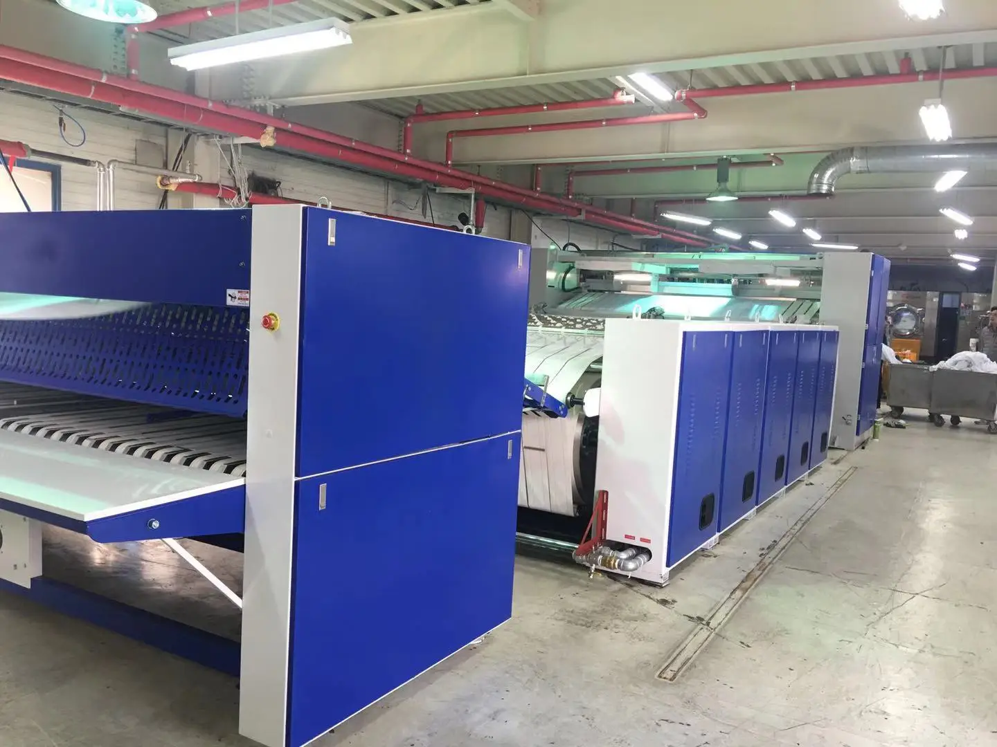 Sheets Feeder Matched with Sheets Ironer and Folder factory