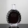 /product-detail/white-clear-transparent-emboss-logo-700ml-liquor-glass-bottle-supplier-62047238577.html