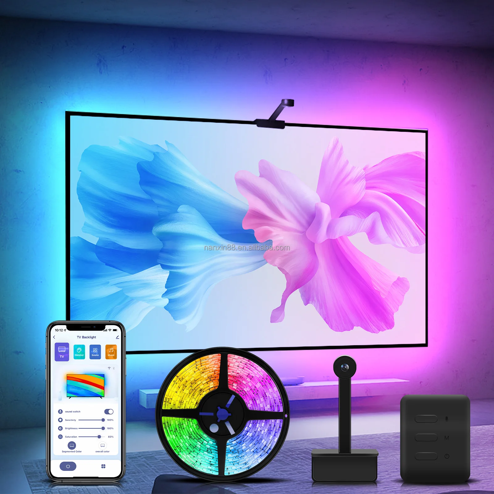 Smart TV with dynamic backlighting showing ambient glow matching on-screen sunset scene