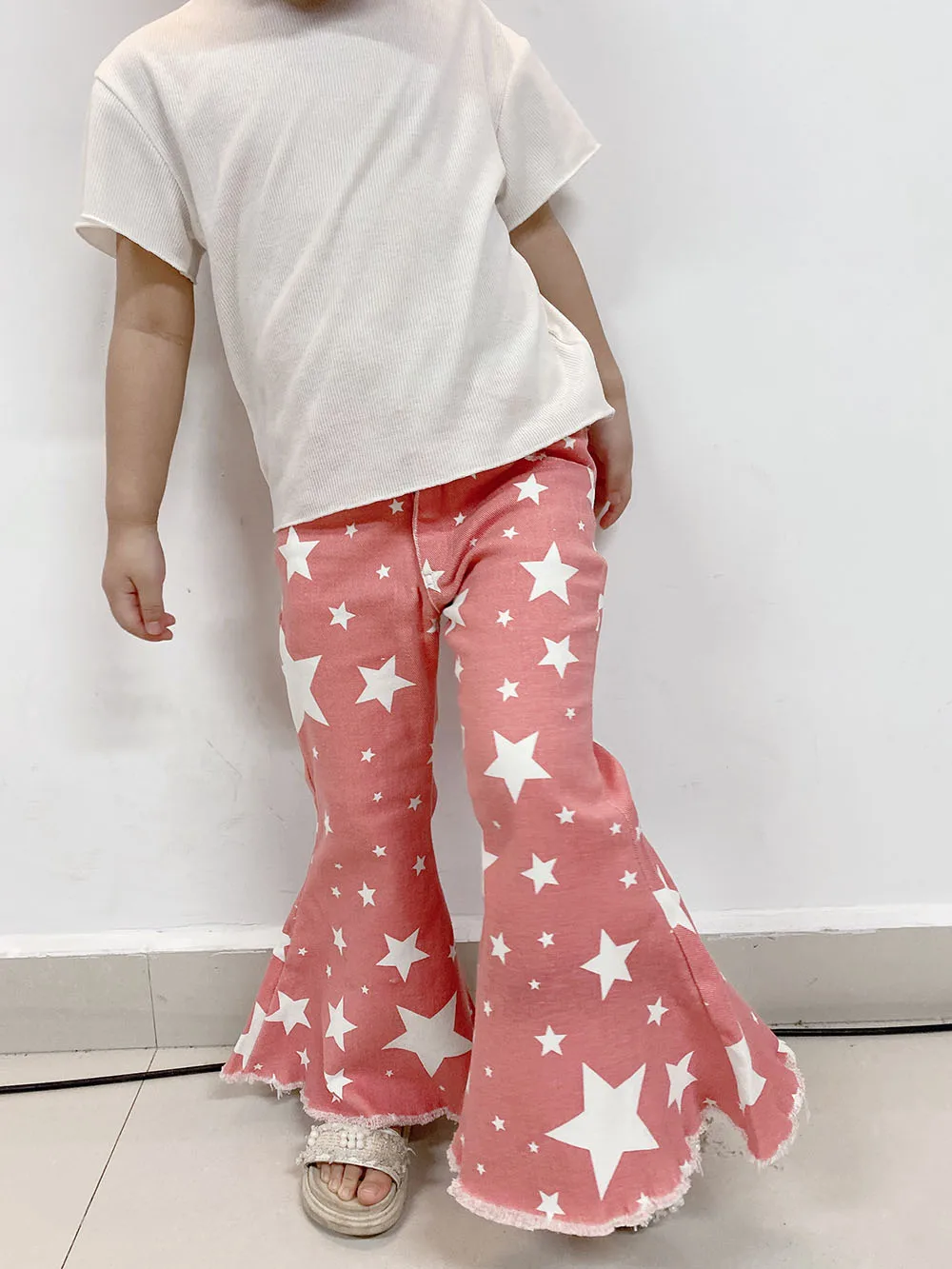 star print bell bottom jeans