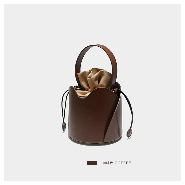 cowhide bucket bolsa