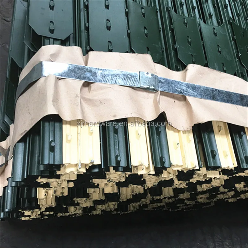 Green T post with spade.jpg