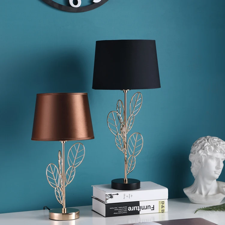 European modern design creative leaf shape iron material luxury gold table lamps for hotel home decor.jpg