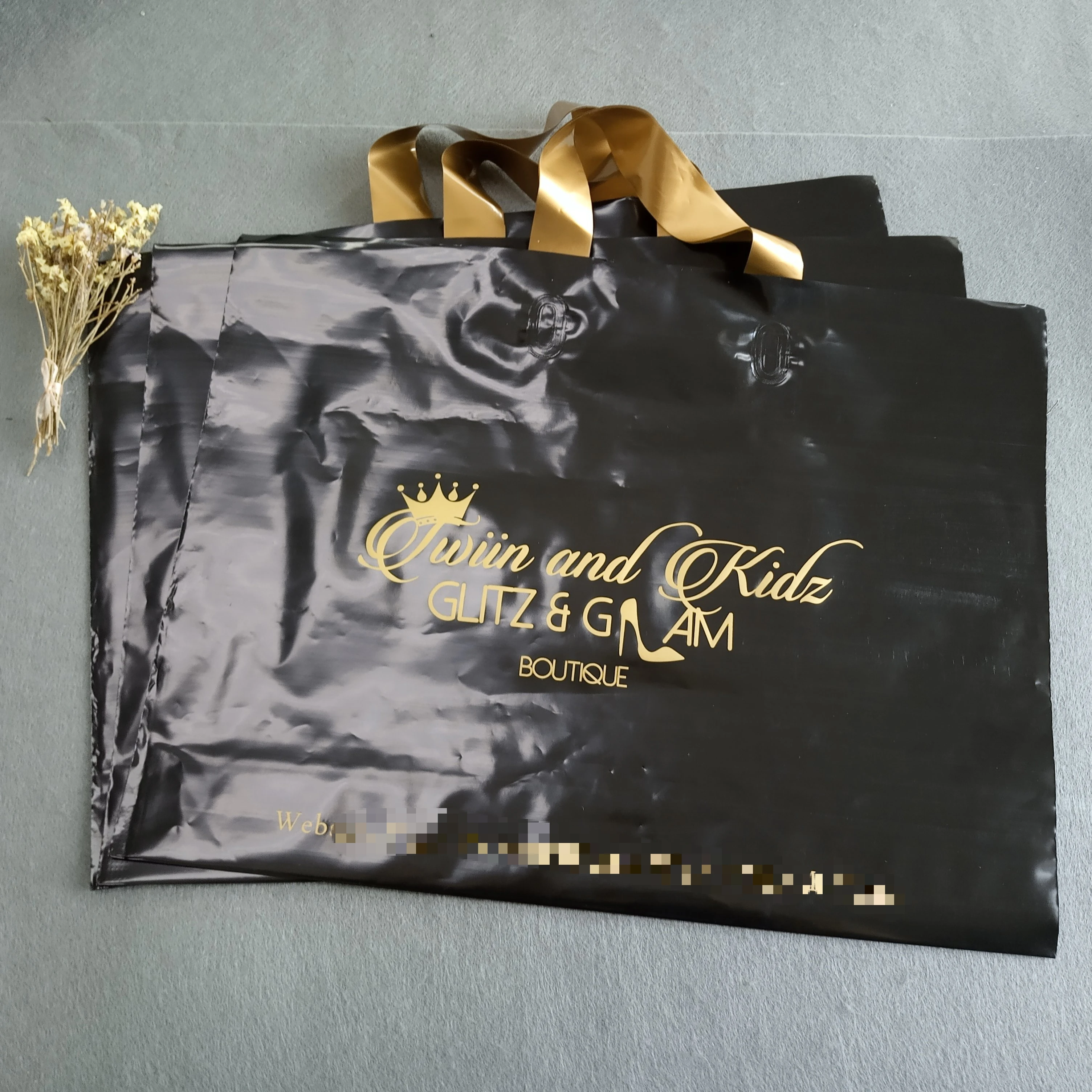 black bag with gold