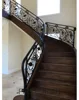 Try a wrought iron stair railing instead of stainless steel handrail