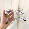 /product-detail/vintage-anti-blue-light-glasses-frame-round-lens-myopia-optical-mirror-simple-metal-women-men-transparent-eyewear-frames-62357755231.html