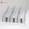 Supermarket plastic adjustable shelf merchandise pusher system