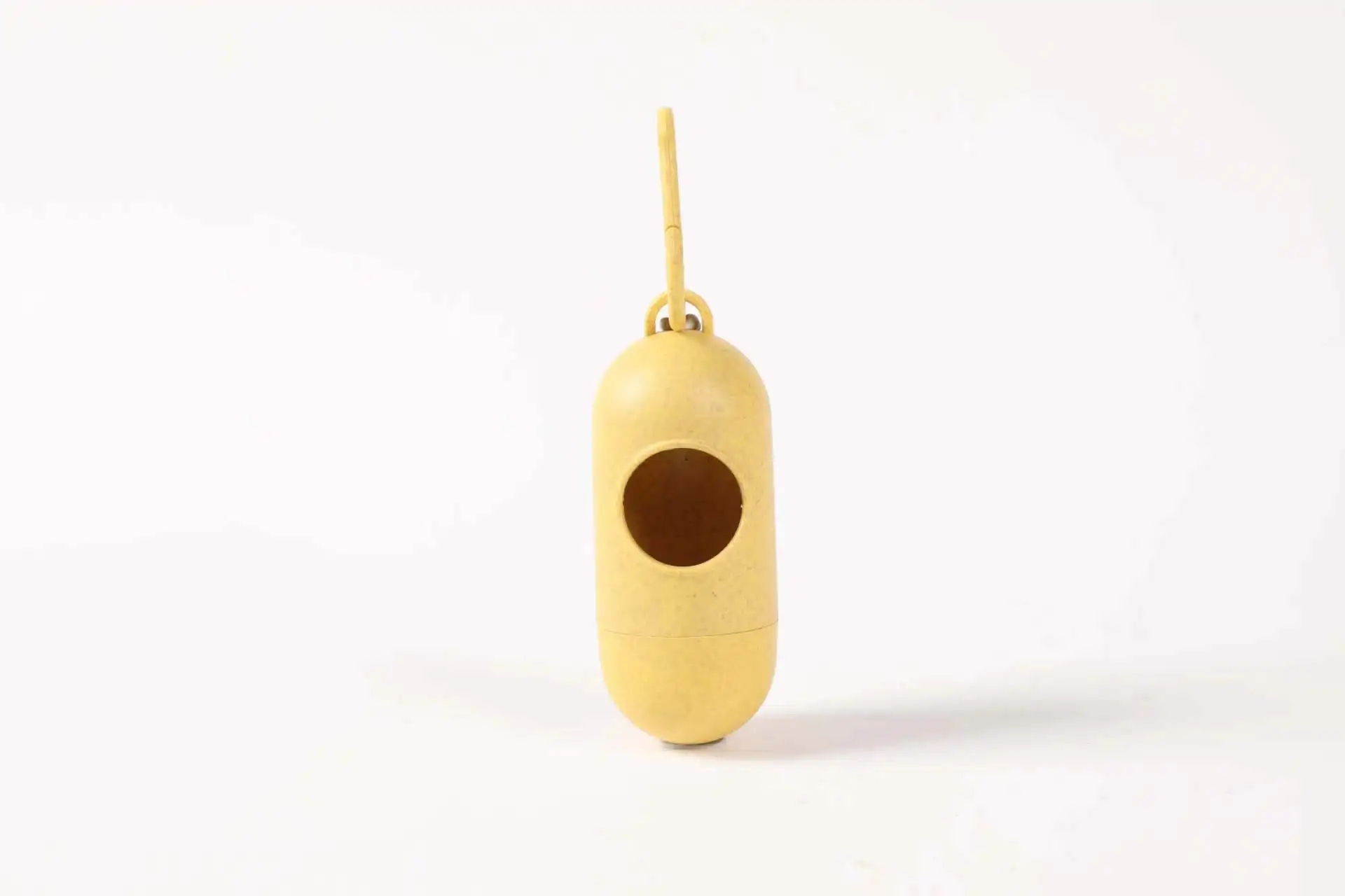 Wholesale Capsule-shaped Wheat-Straw Pet Waste Bag Holder Dog Poop Bag Dispenser