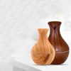 /product-detail/electric-humidifier-essential-aroma-oil-diffuser-ultrasonic-wood-grain-air-humidifier-62335714319.html