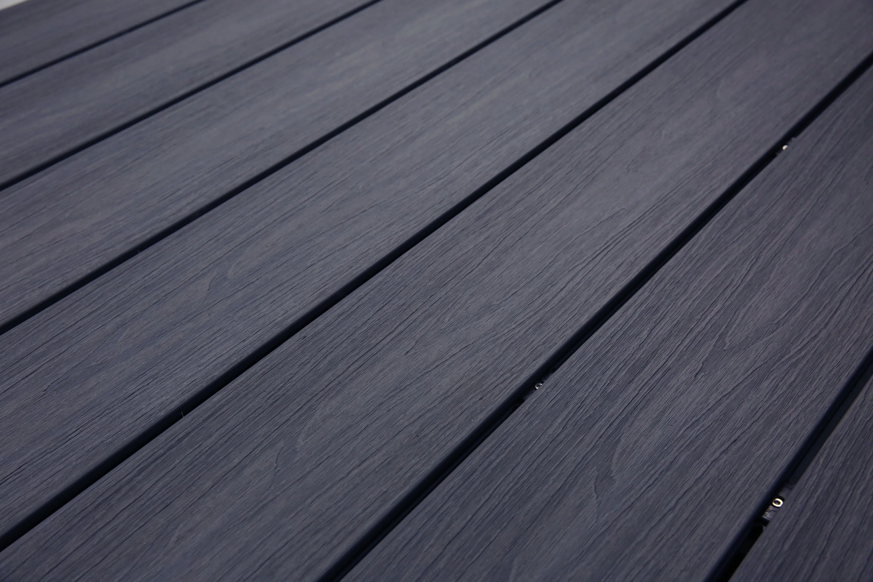 便宜的抗虫害木纹表面 wpc 木塑复合停车区湿区塑料地板