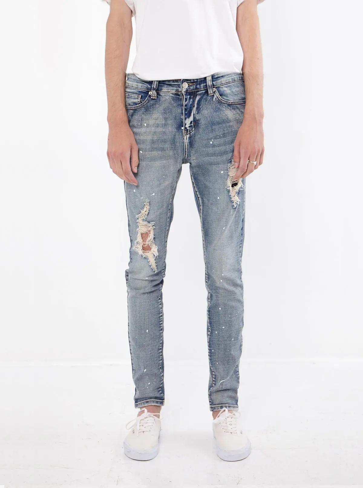 distressed designer jeans