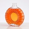 Customized brandy glass liquor spirit bottle with cork stopper transparent sun disk shape brandy bottle 500ml