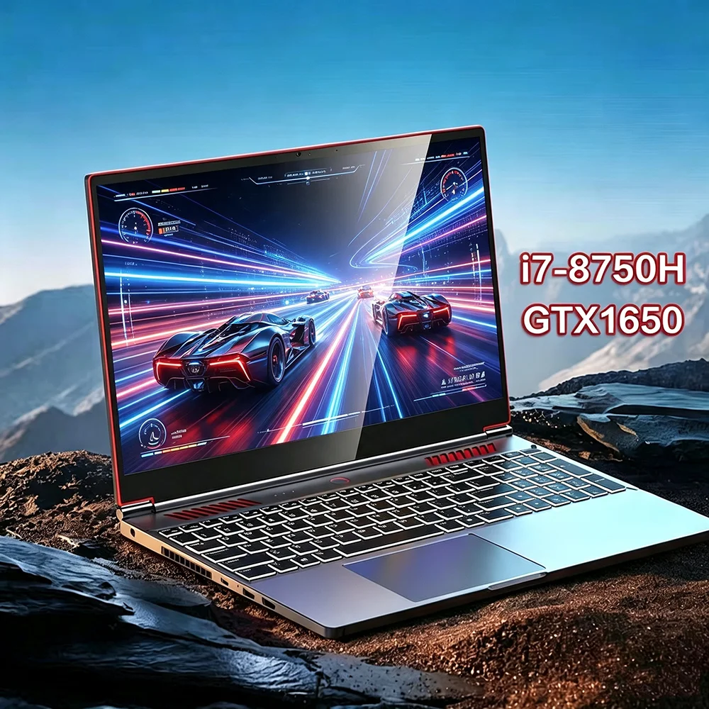 14-inch laptop open next to coffee cup and notebook on cafe table