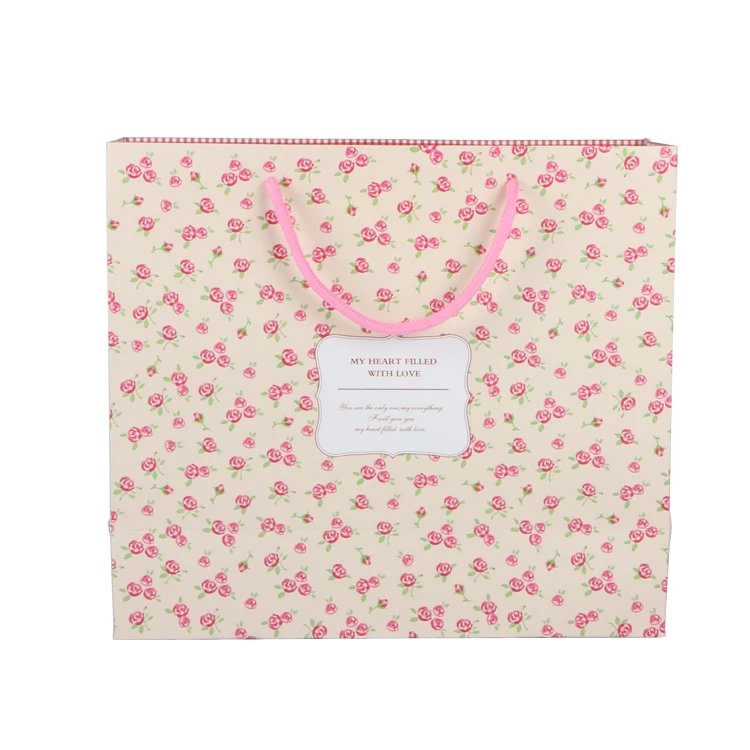 Pink eco friendly luxury paper packing bag for gift jewelry with ribbon handle
