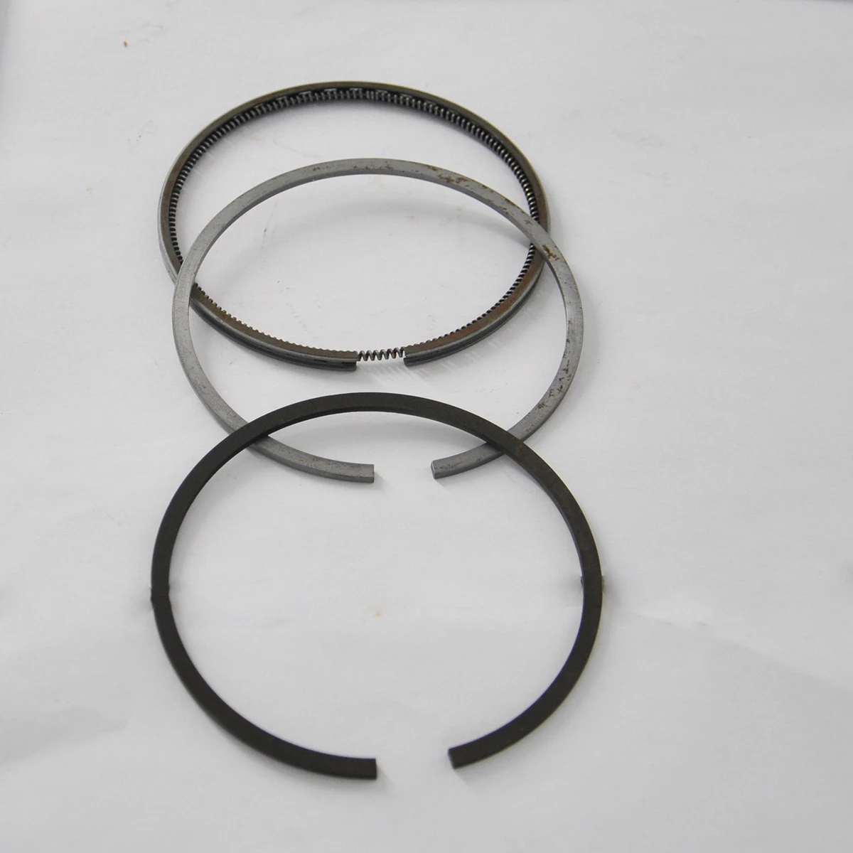 Колечки на поршень clack. Кольца на цилиндр 84 мм. Кольца 84 мм. 7. 2 1.