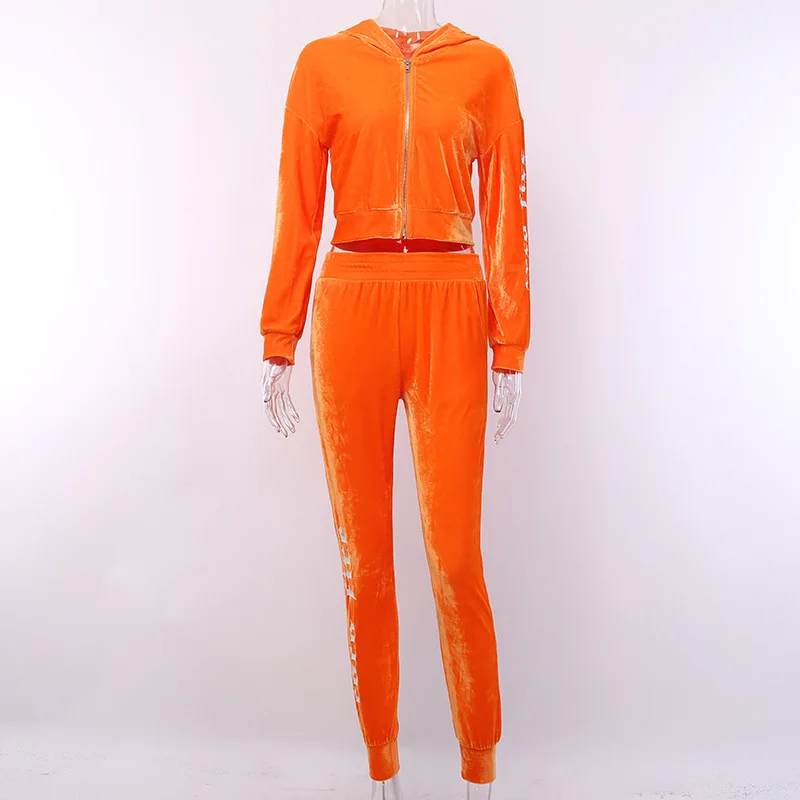 orange velvet tracksuit