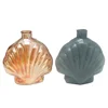 Haodexin 10oz shell shaped glass decorative reed diffuser bottles with rattan sticks