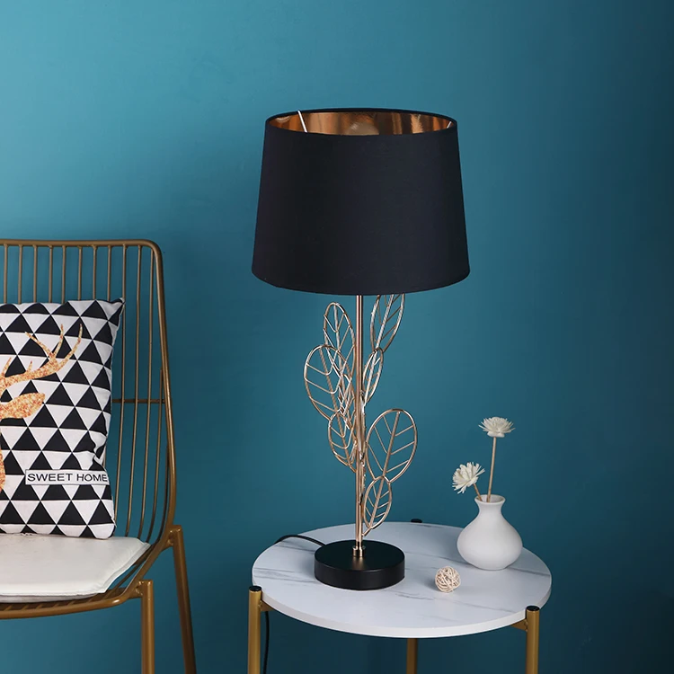 European modern design creative leaf shape iron material luxury gold table lamps for hotel home decor.jpg