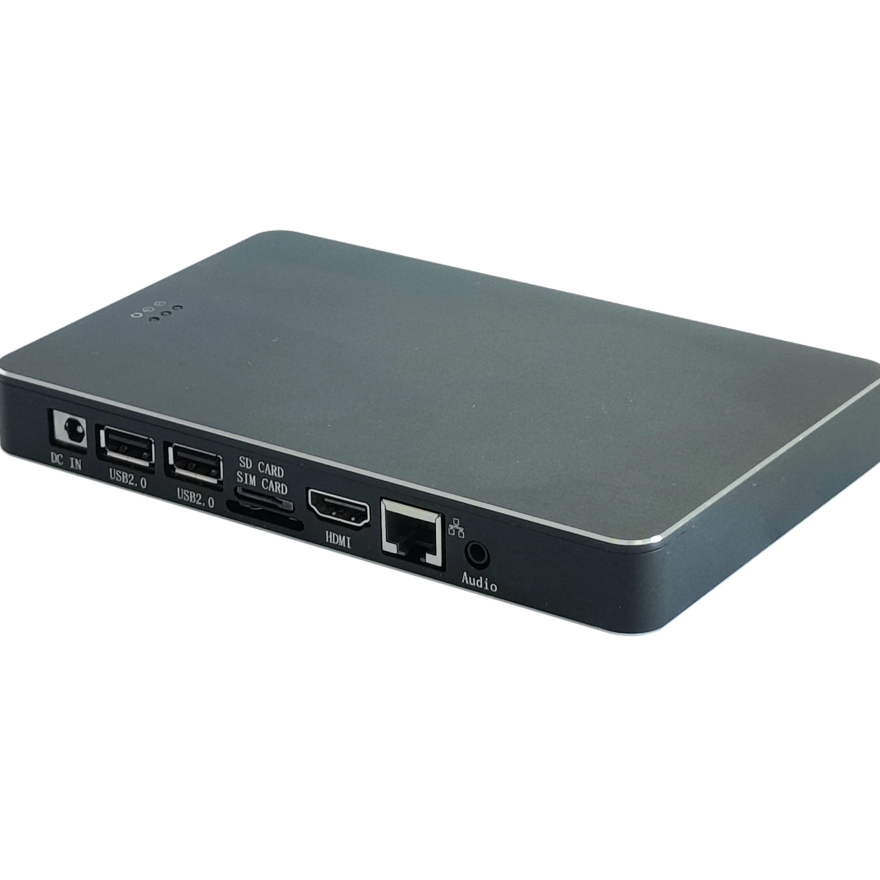 Compact Android mini PC with HDMI, USB-C, and microSD slots mounted on VESA plate