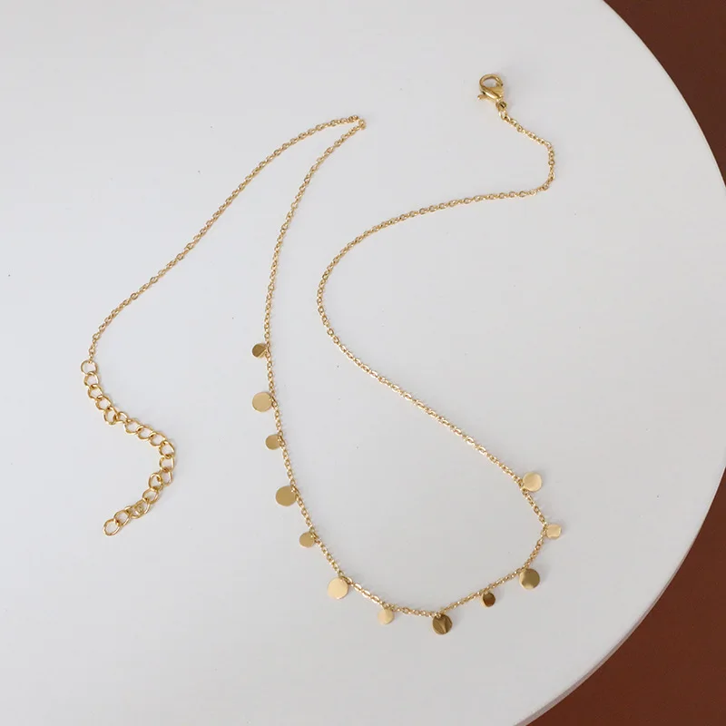 gold necklace with little circles