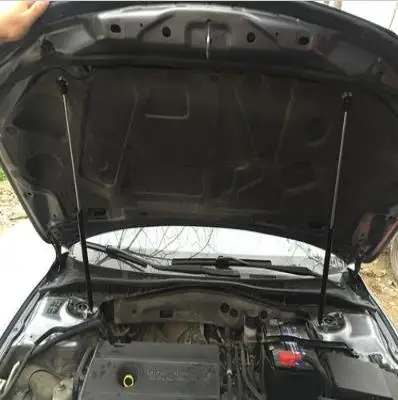 Car front cover supporting gas spring