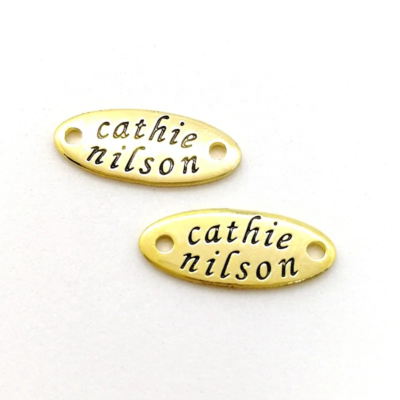 gold plated oval jewelry tags.jpg