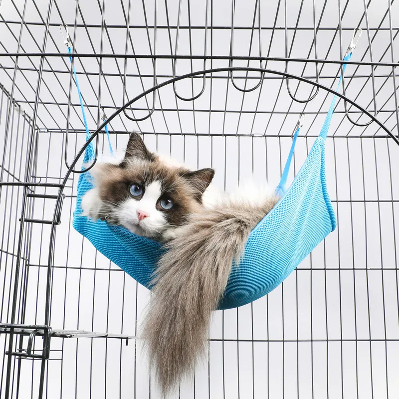 cat sleeping cage